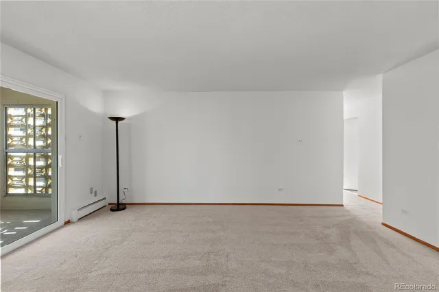 a bathroom with a sink a mirror toilet and shower