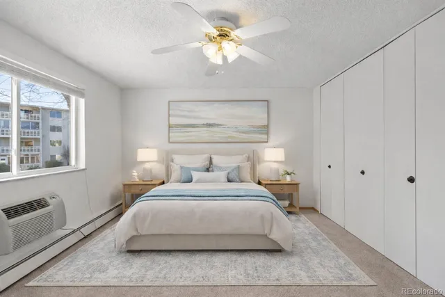 a room with a bed and a window