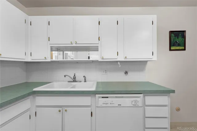 an empty room with floor to ceiling window and an empty room