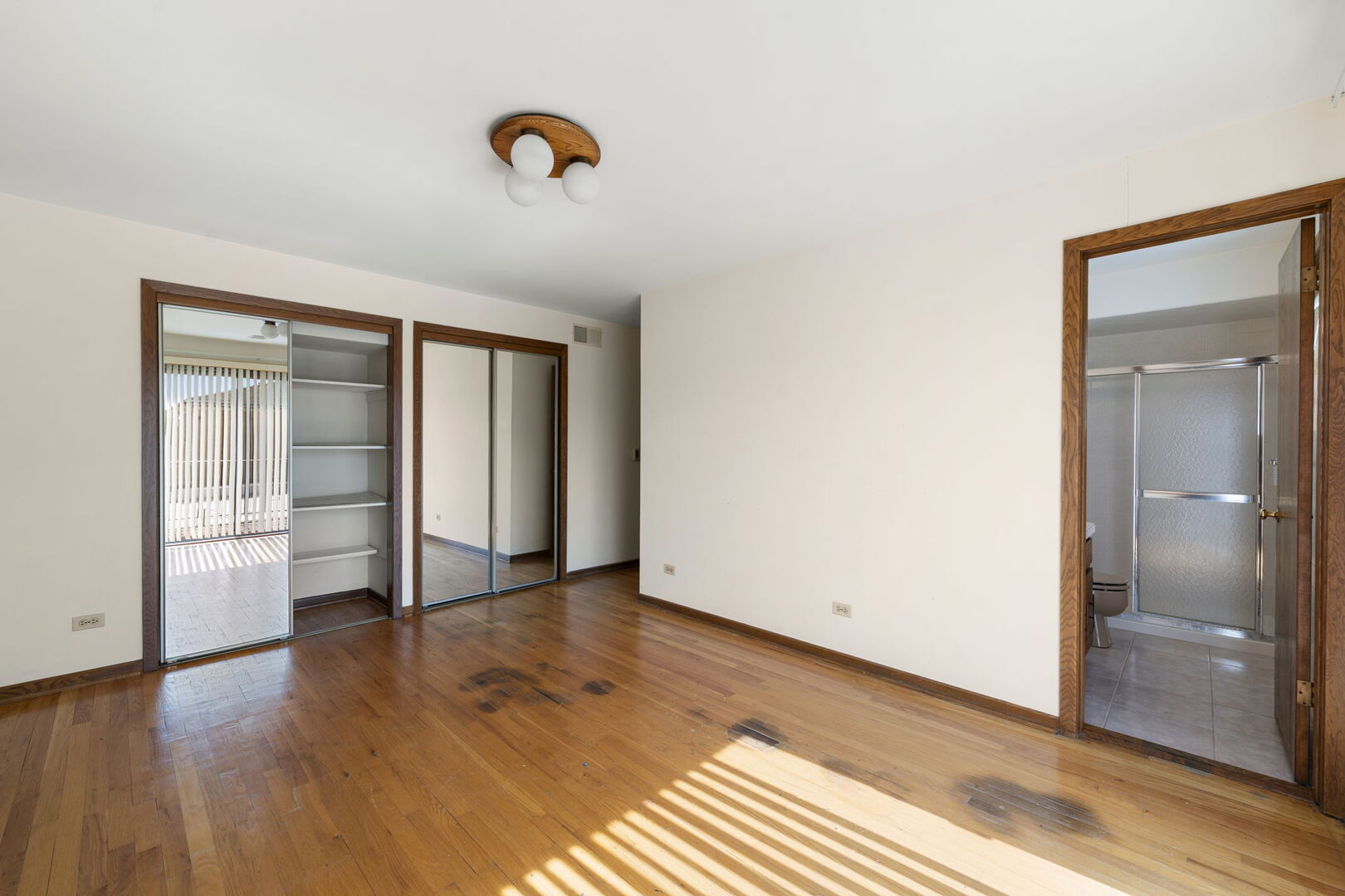 8427 West Windsor Avenue, Unit 2 Chicago, IL 60656 - Photo 16 of 37 wooden floor in an empty room