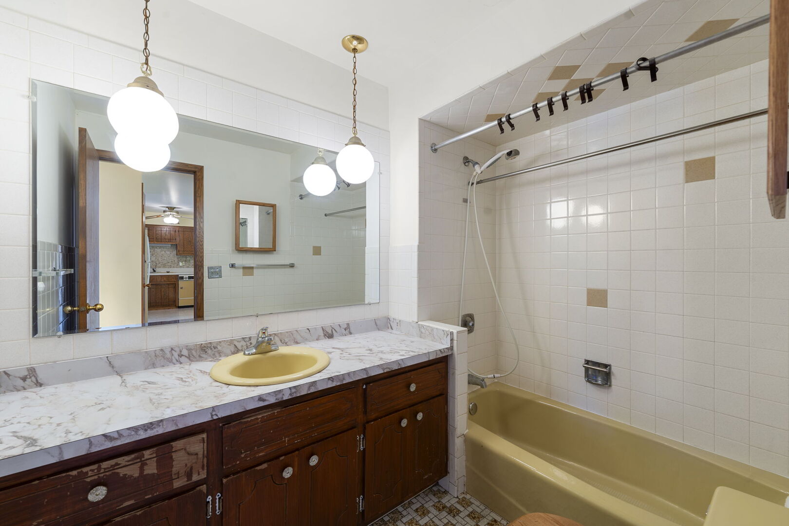 8427 West Windsor Avenue, Unit 2 Chicago, IL 60656 - Photo 19 of 37 a bathroom with a granite countertop sink mirror and shower