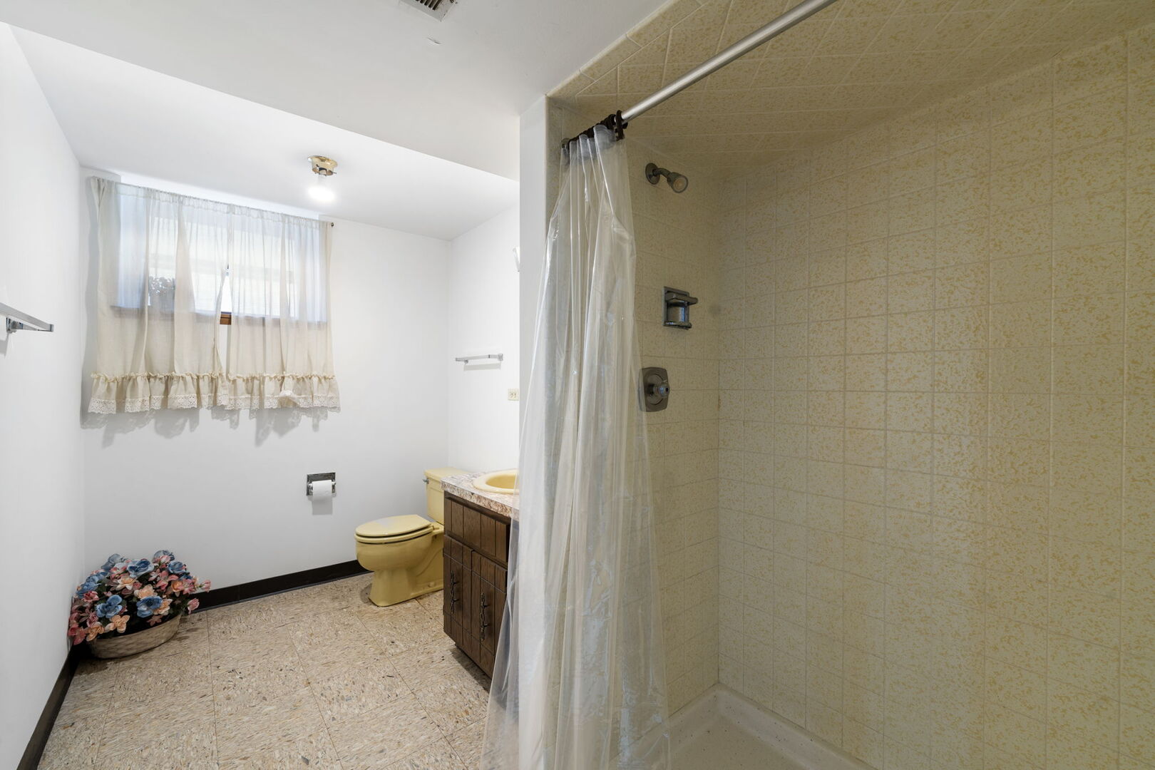 8427 West Windsor Avenue, Unit 2 Chicago, IL 60656 - Photo 27 of 37 a bathroom with a toilet a sink and shower