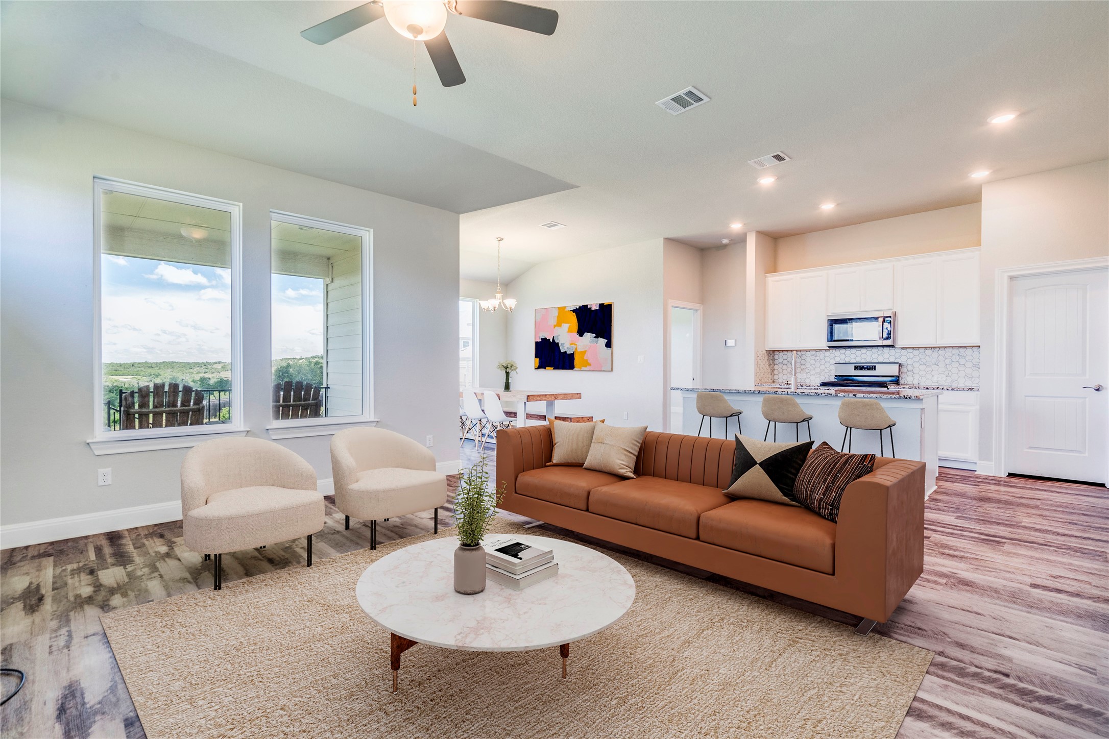 130 Sierra Blanca Road Dripping Springs, TX 78620 - Photo 9 of 24 a living room with furniture and a large window