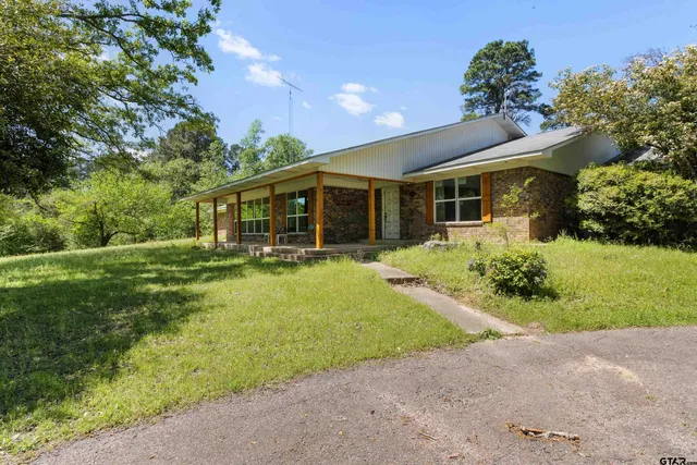 a front view of house with yard