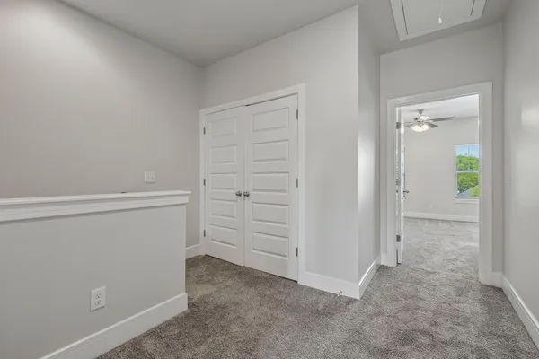 wooden view of closet area