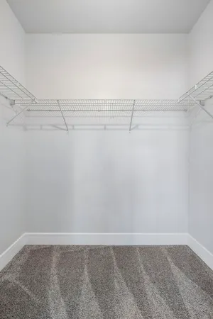 a view of a room with racks on the wall