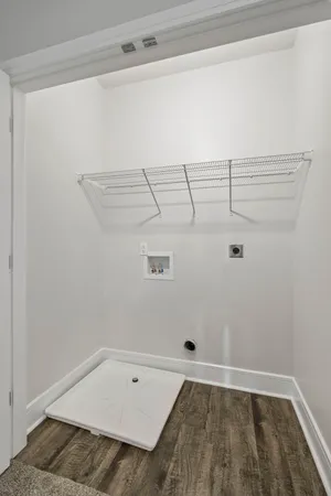 a view of a room with racks on the wall