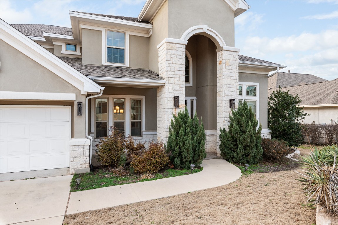 273 Jacksdaw Drive Austin, TX 78737 - Photo 1 of 1 a view of a house with a yard