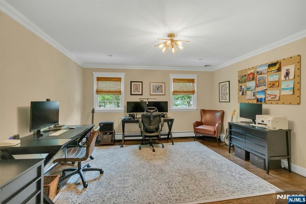 48 Hopper Farm Road Upper Saddle River, NJ 07458 - Photo 30 of 43 a view of a workspace with furniture and a window