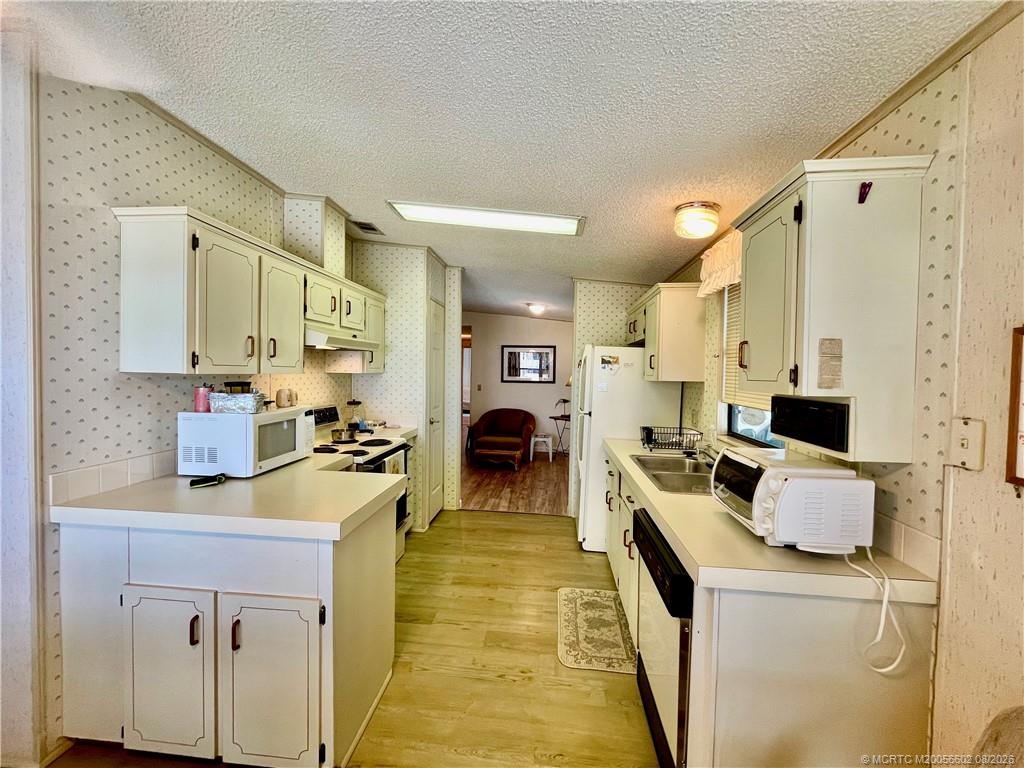 14464 Southwest Rake Drive Indiantown, FL 34956 - Photo 5 of 36 Gallery Image 5
