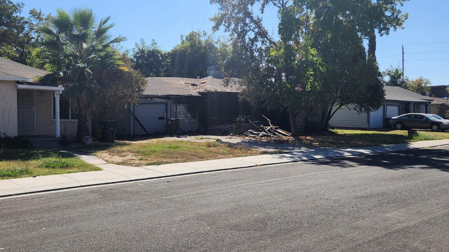 2518 Inman Avenue Stockton, CA 95204 - Photo 1 of 1 a view of a house with a yard and garage