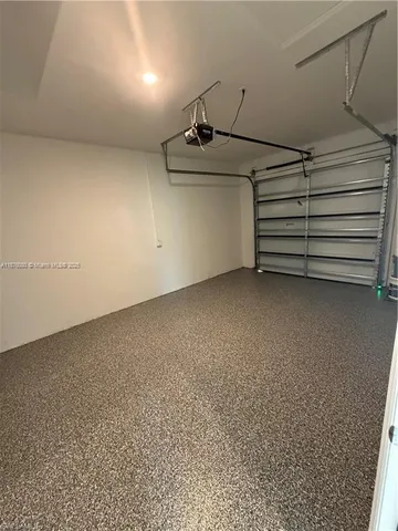 a view of room that has a bed