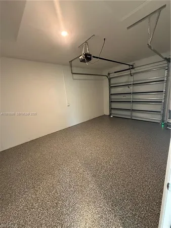 a view of room that has a bed