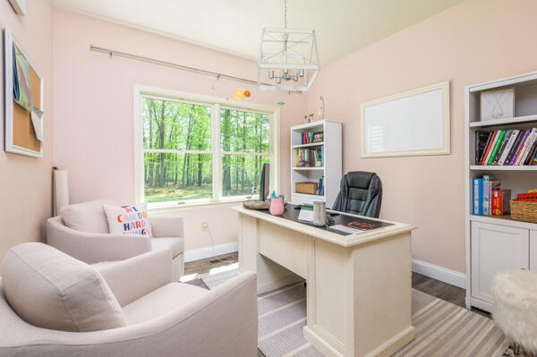 164 Summit Road Swiftwater, PA 18370 - Photo 6 of 42 a work room with furniture a rug and a window