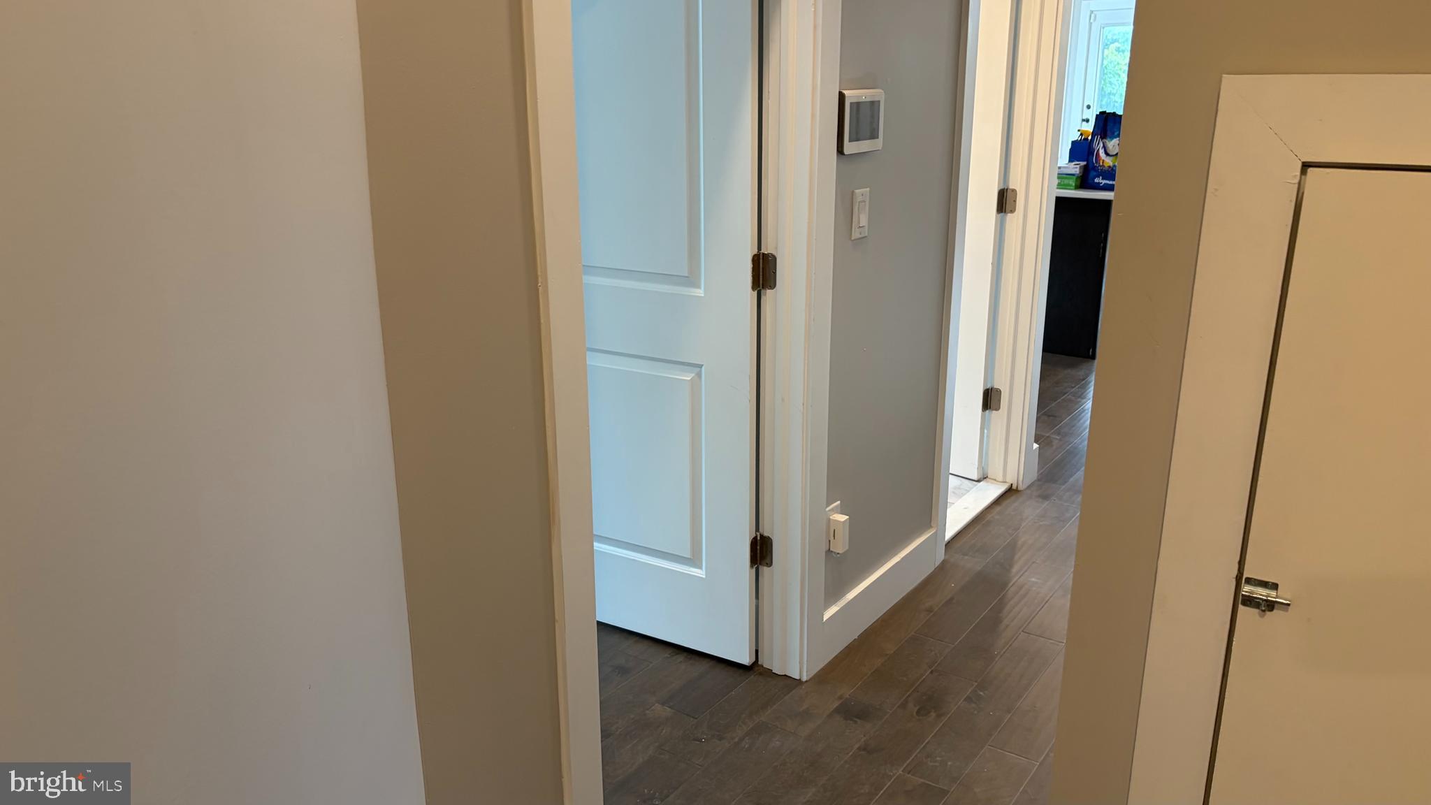 2001 North 33rd Street, Unit 2 Philadelphia, PA 19121 - Photo 17 of 26 a view of a hallway with wooden floor