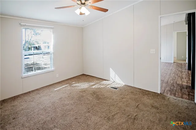 a bathroom with a sink double vanity and a mirror