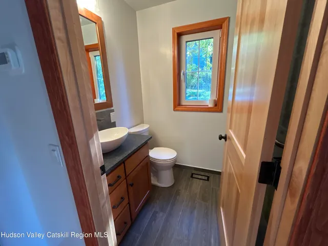 a bathroom with a sink and a toilet