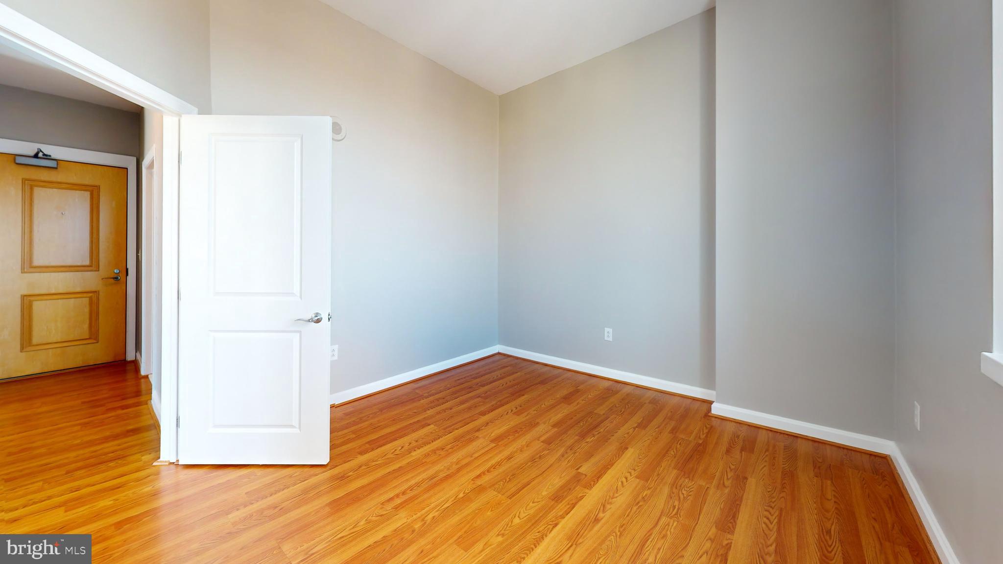 901 North Penn Street, Unit R2404 Philadelphia, PA 19123 - Photo 21 of 29 a view of a room with wooden floor