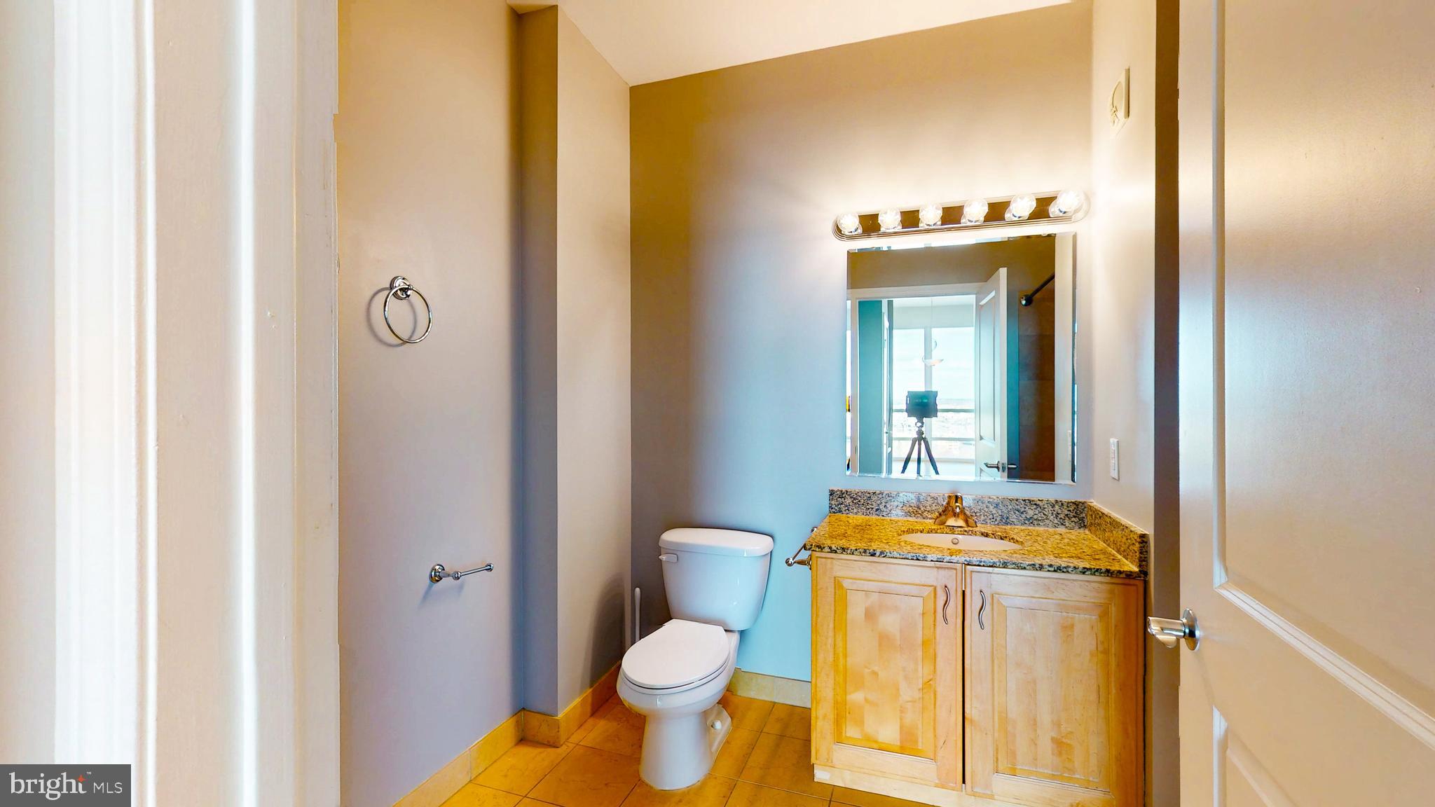 901 North Penn Street, Unit R2404 Philadelphia, PA 19123 - Photo 24 of 29 a bathroom with a sink and a toilet