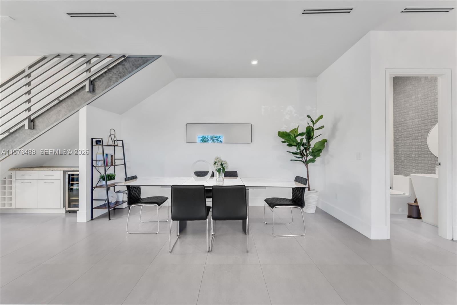 3055 Carter Street, Unit 3055 Miami, FL 33133 - Photo 13 of 32 a view of a workspace with furniture