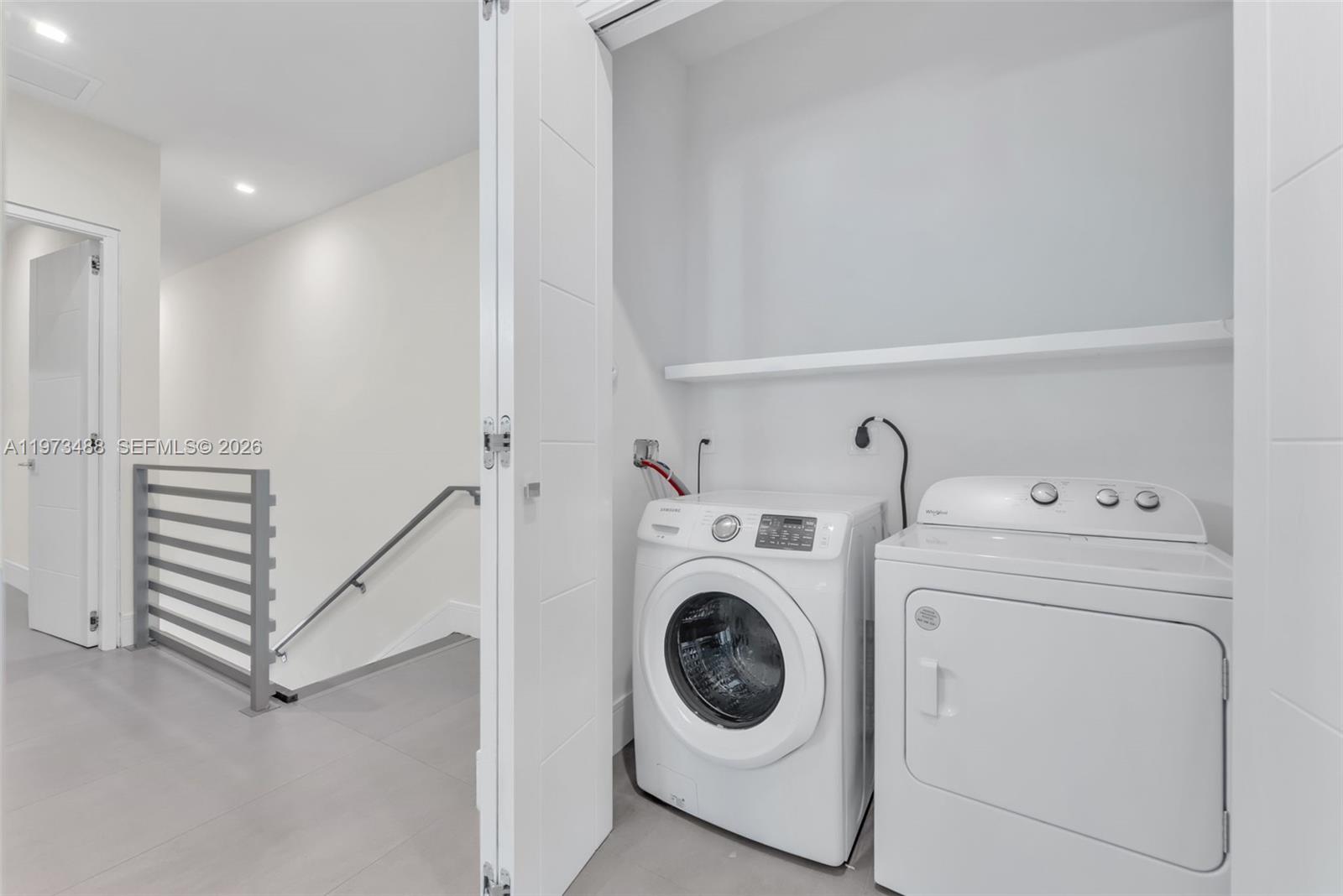 3055 Carter Street, Unit 3055 Miami, FL 33133 - Photo 19 of 32 a utility room with dryer and washer