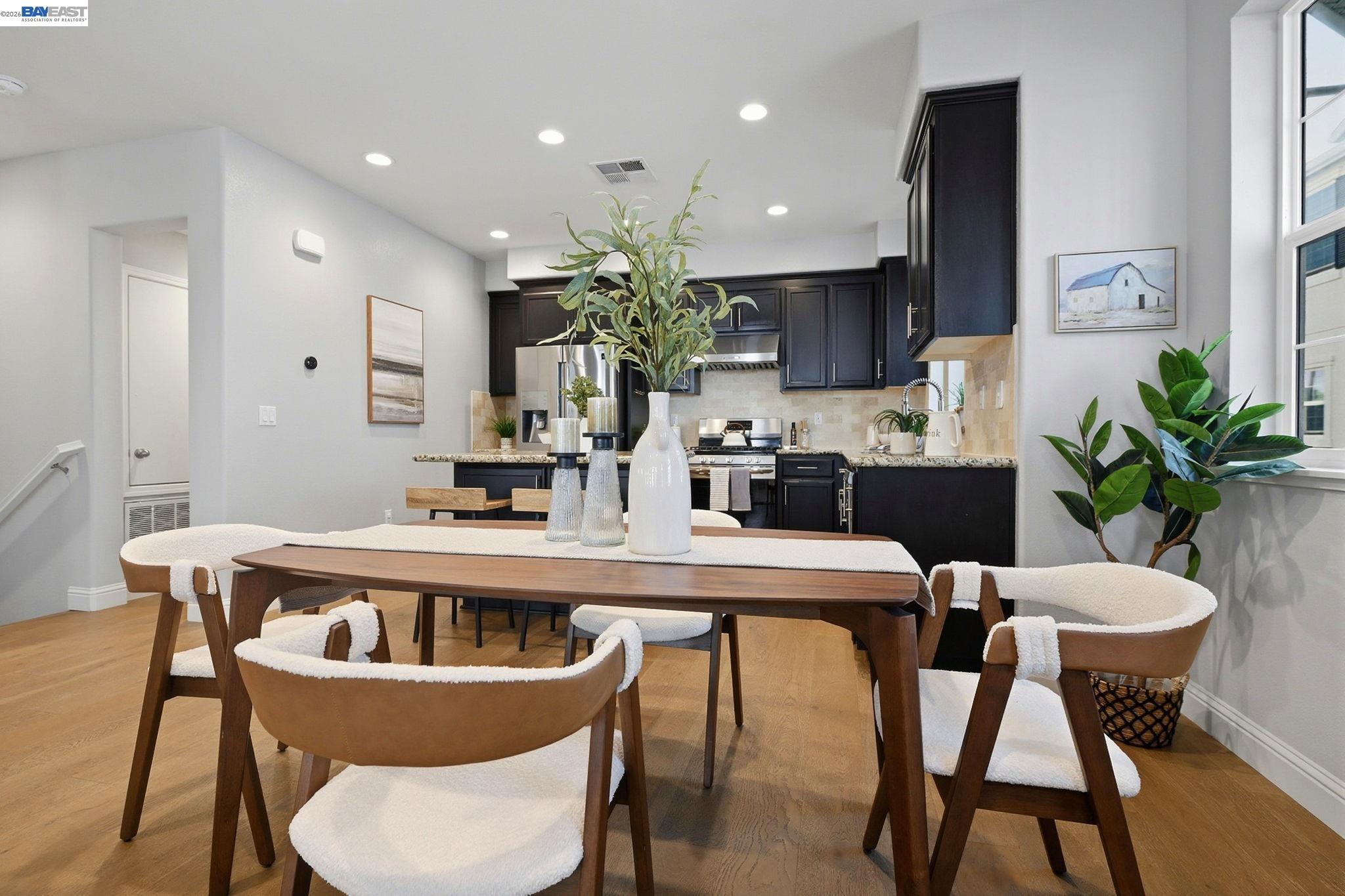 287 Wild Rose Way Milpitas, CA 95035 - Photo 15 of 45 a view of a dining room with furniture and wooden floor
