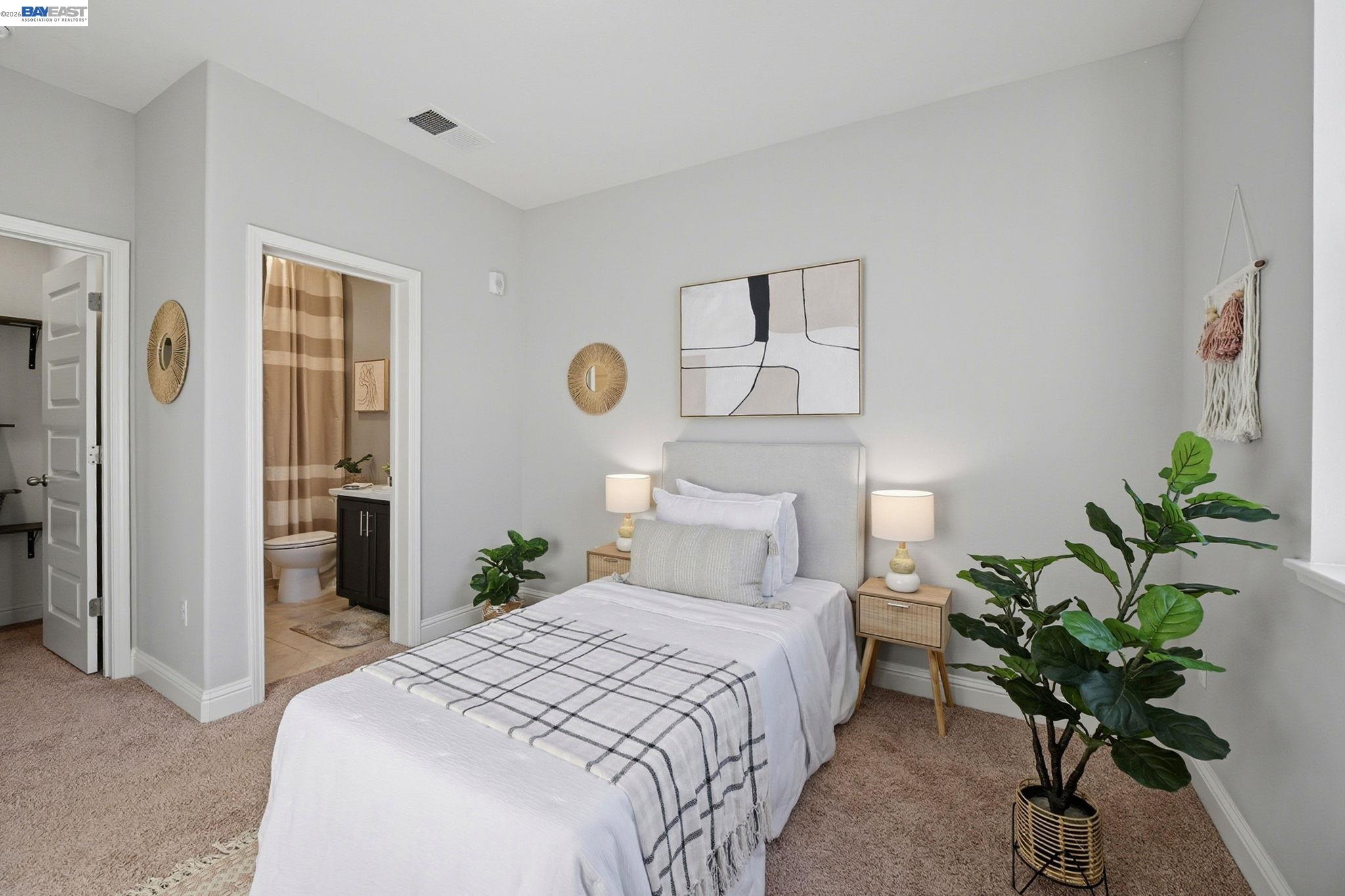 287 Wild Rose Way Milpitas, CA 95035 - Photo 20 of 45 a bedroom with bed and a potted plant