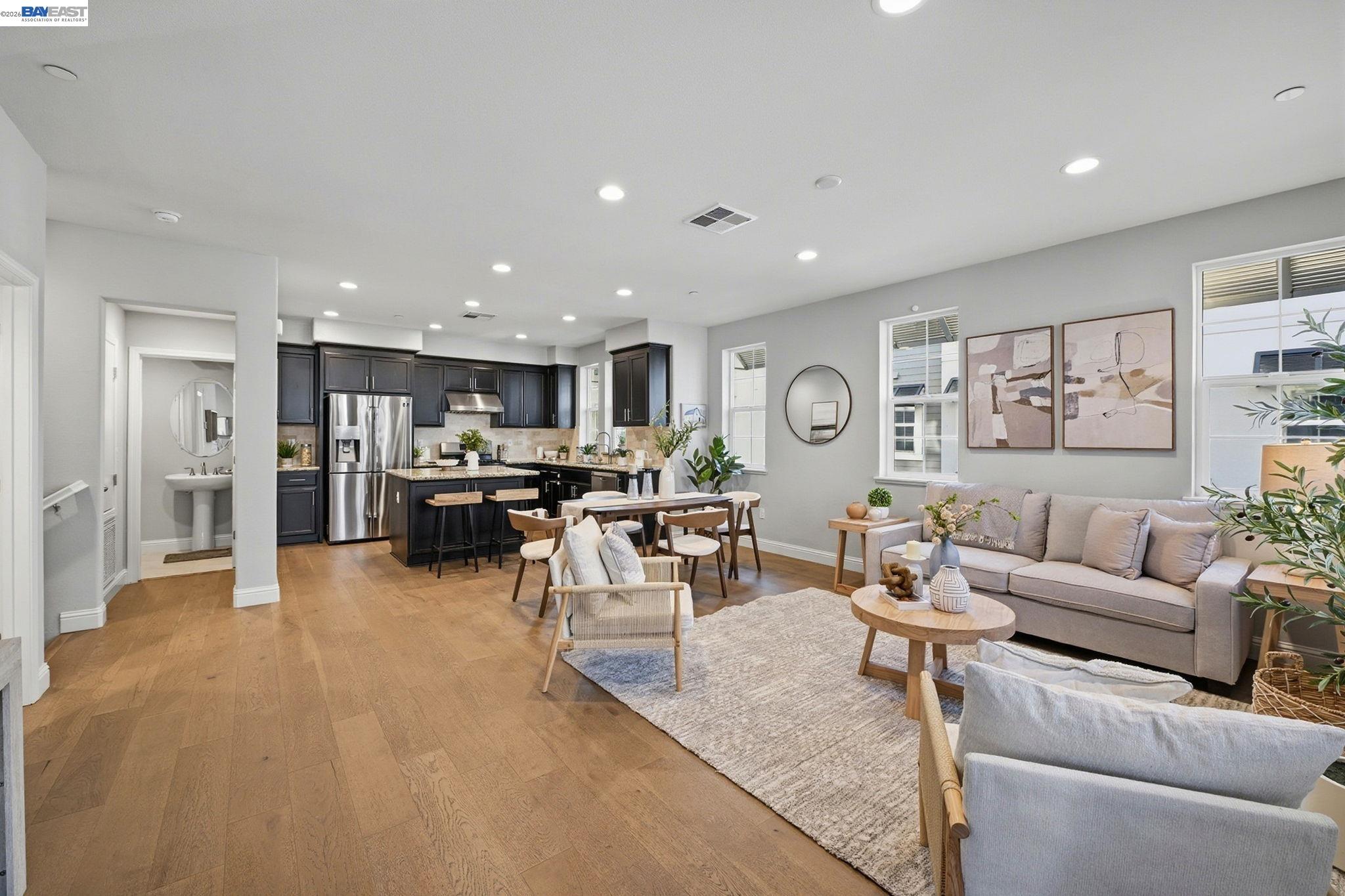 287 Wild Rose Way Milpitas, CA 95035 - Photo 2 of 45 a living room with furniture and kitchen view
