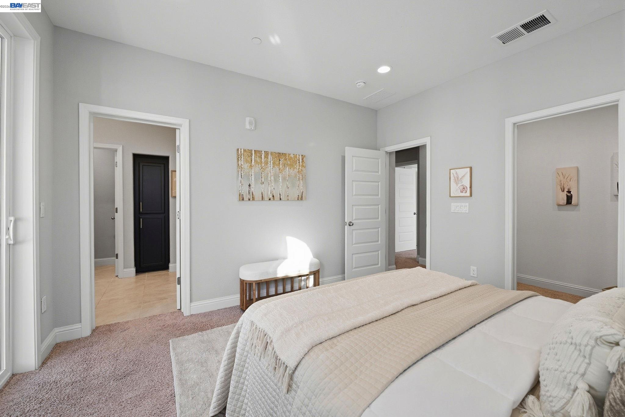 287 Wild Rose Way Milpitas, CA 95035 - Photo 25 of 45 a bedroom with a bed and painting on the wall