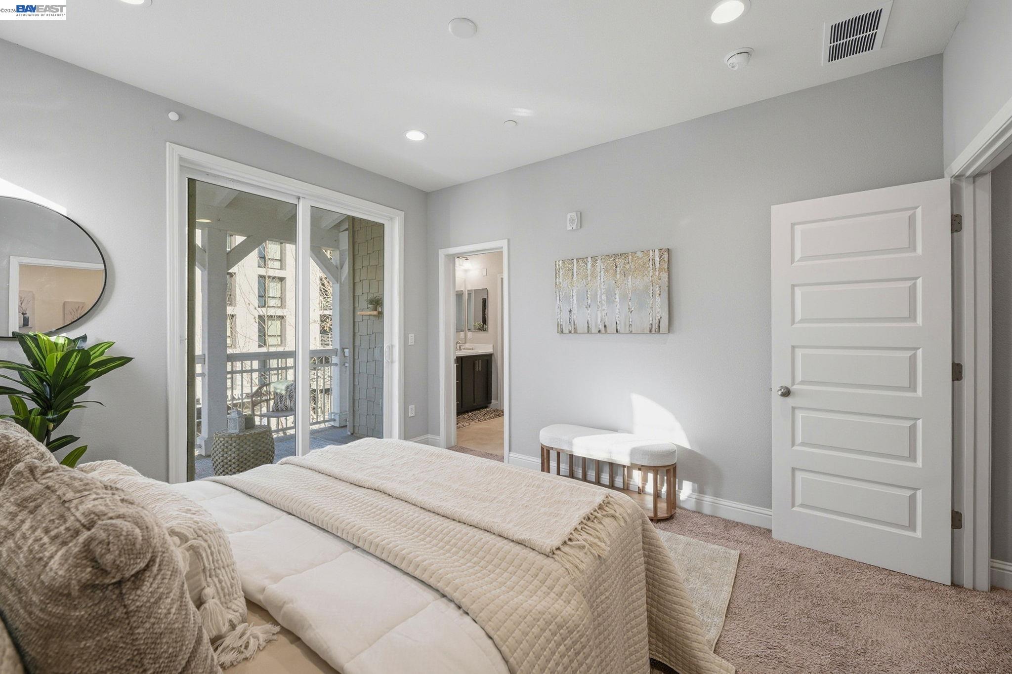 287 Wild Rose Way Milpitas, CA 95035 - Photo 26 of 45 a bedroom with a large bed and a window