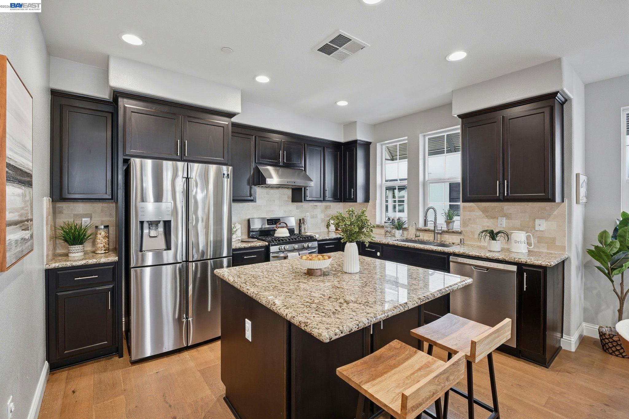 287 Wild Rose Way Milpitas, CA 95035 - Photo 3 of 45 a kitchen with a refrigerator a stove a sink and a refrigerator