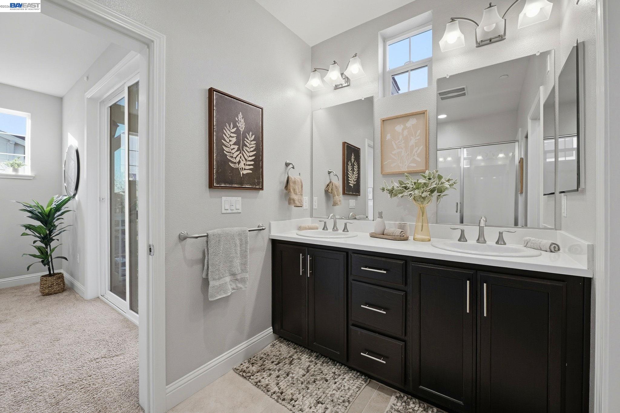 287 Wild Rose Way Milpitas, CA 95035 - Photo 32 of 45 a bathroom with a sink double vanity and a mirror