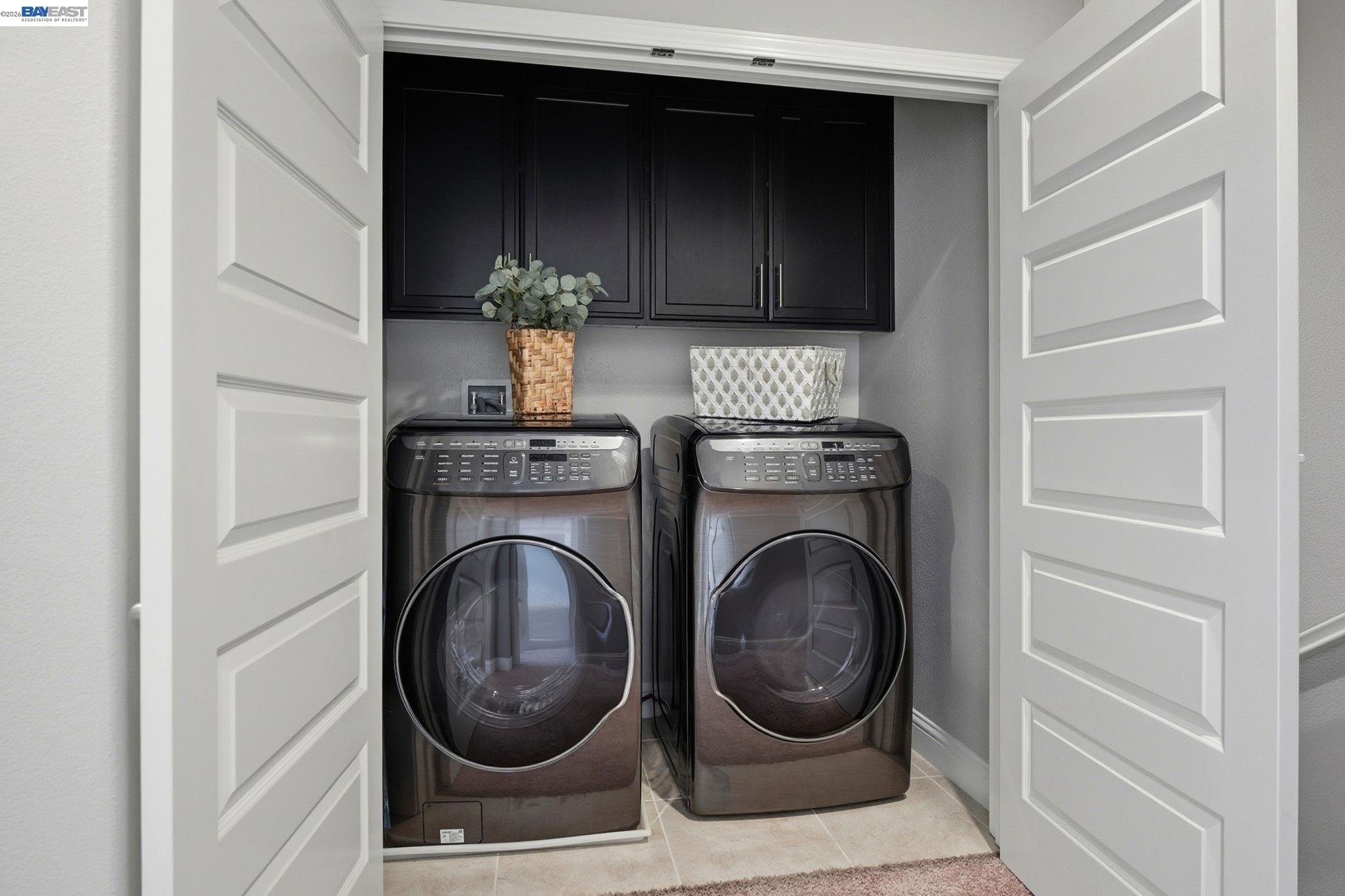 287 Wild Rose Way Milpitas, CA 95035 - Photo 35 of 45 a utility room with dryer and washer
