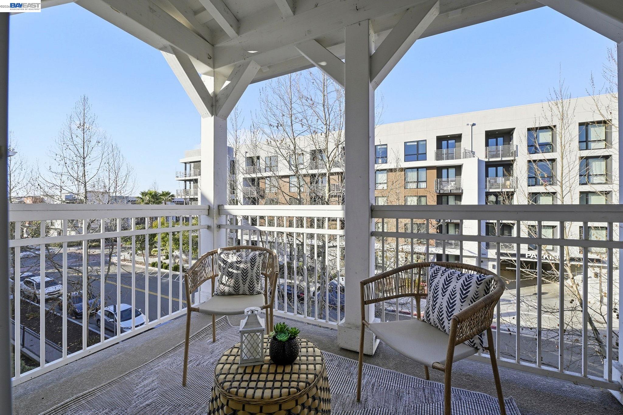 287 Wild Rose Way Milpitas, CA 95035 - Photo 5 of 45 a view of a chairs and table in the balcony