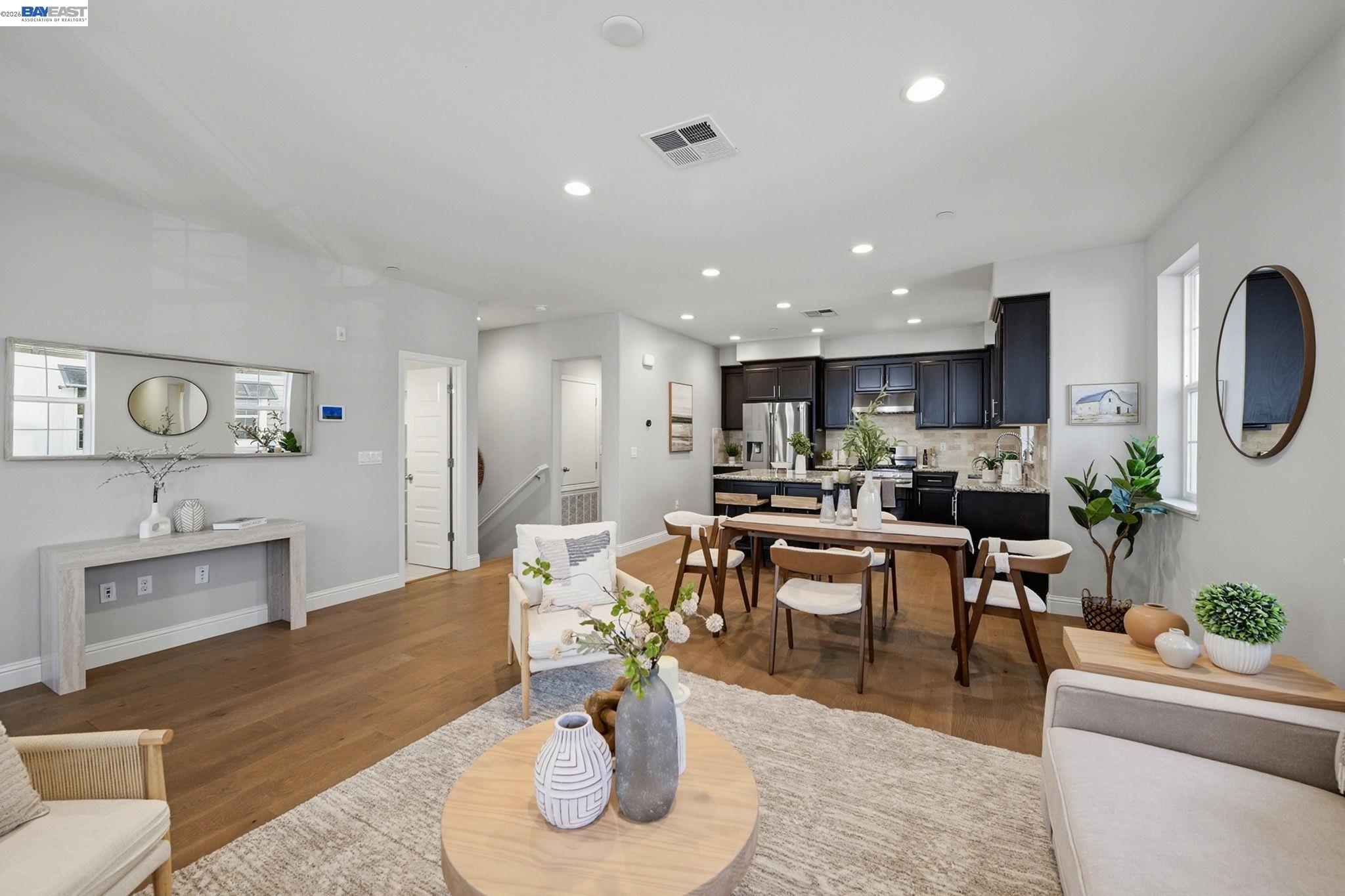287 Wild Rose Way Milpitas, CA 95035 - Photo 6 of 45 a living room with furniture kitchen view and a table