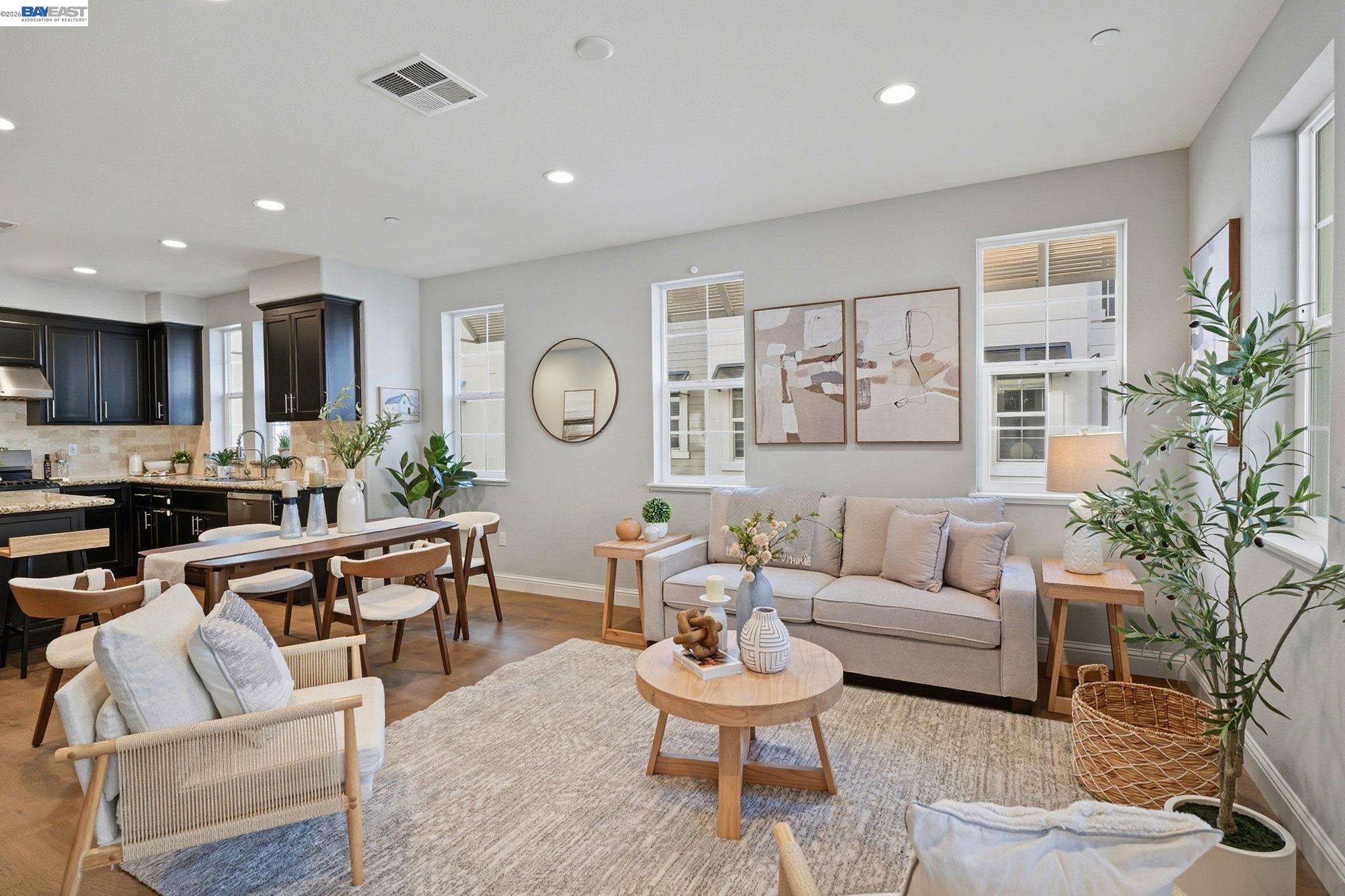 287 Wild Rose Way Milpitas, CA 95035 - Photo 7 of 45 a living room with furniture kitchen view and a potted plant
