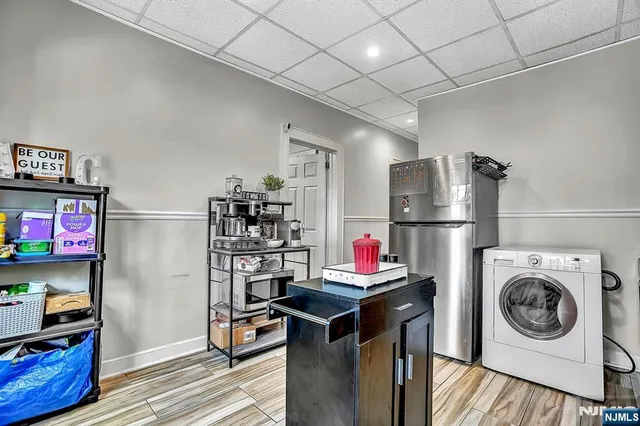 a view of a storage & utility room with washer and dryer