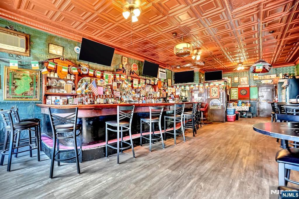 699 Elm Street Kearny, NJ 07032 - Photo 2 of 37 a view of a chairs and table in a patio
