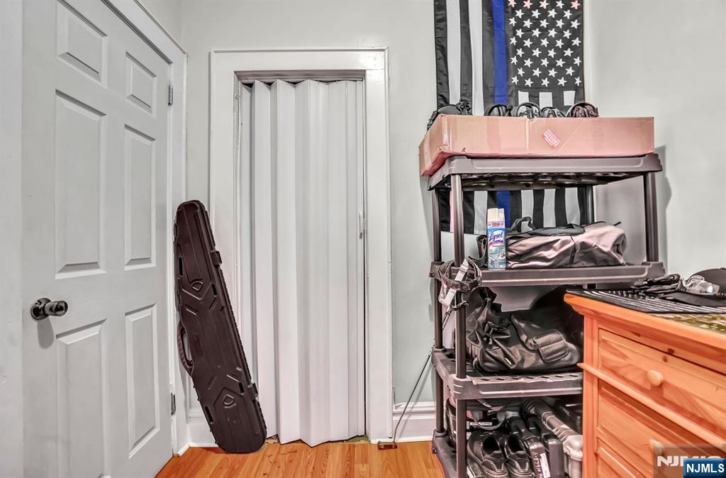 699 Elm Street Kearny, NJ 07032 - Photo 22 of 37 a view of a balcony with furniture and floor to ceiling window