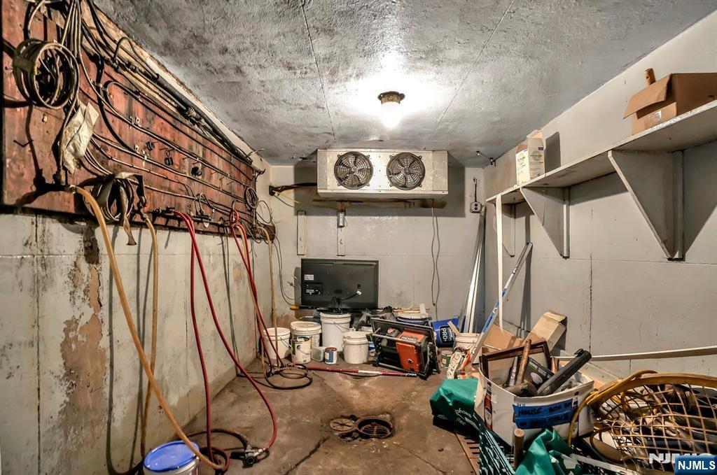 699 Elm Street Kearny, NJ 07032 - Photo 10 of 37 a view of a livingroom with furniture and floor to ceiling window