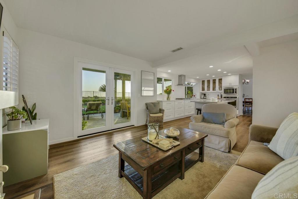5068 Nighthawk Way Oceanside, CA 92056 - Photo 12 of 39 a living room with furniture and a large window