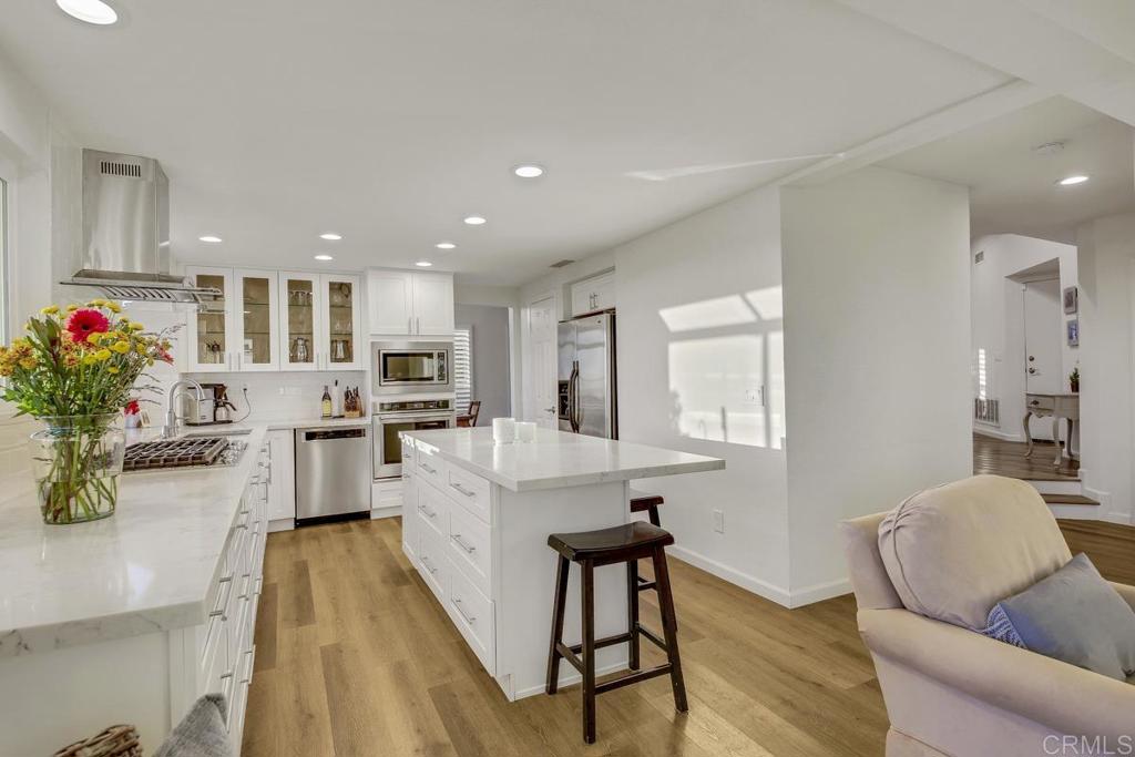 5068 Nighthawk Way Oceanside, CA 92056 - Photo 13 of 39 a living room with furniture and flowers