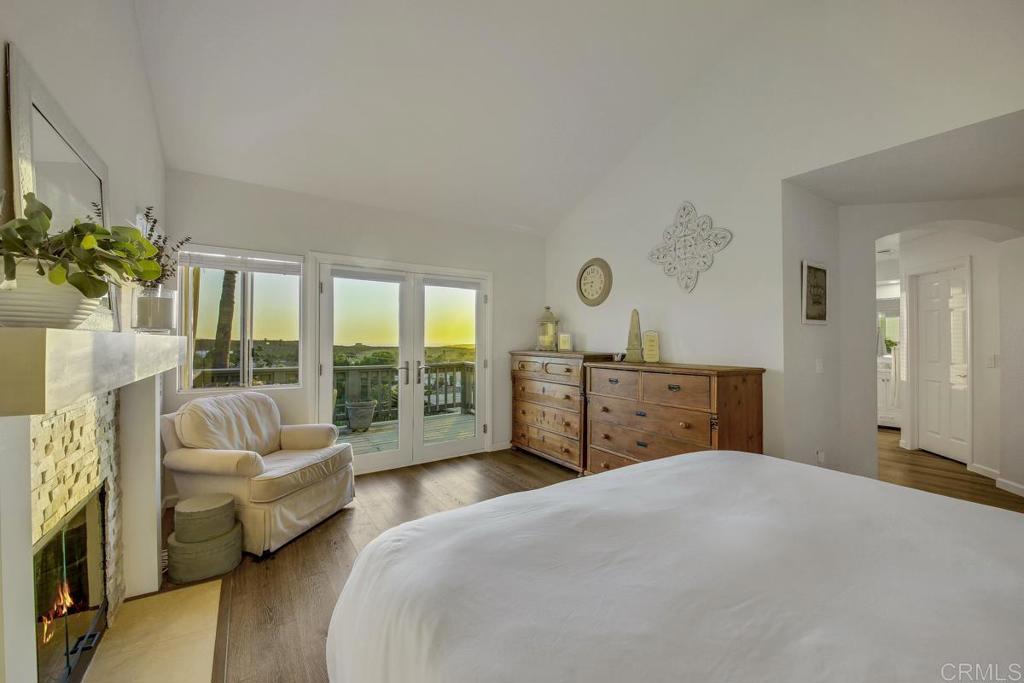 5068 Nighthawk Way Oceanside, CA 92056 - Photo 25 of 39 a bedroom with a bed and couch