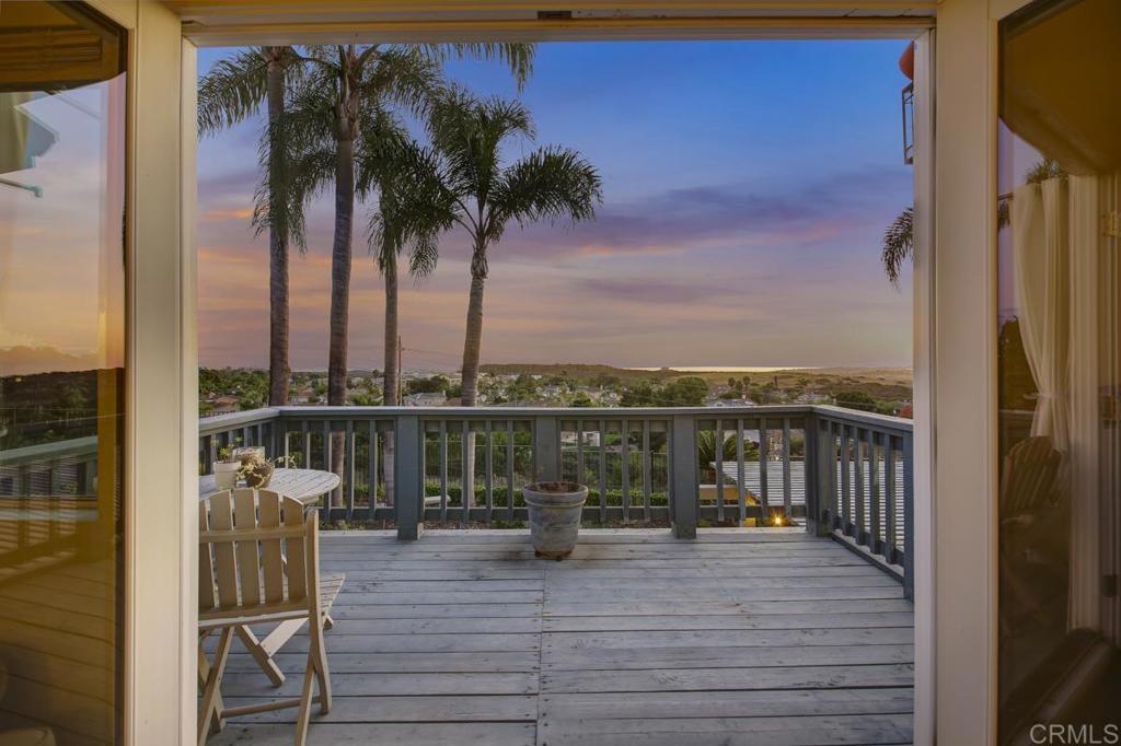 5068 Nighthawk Way Oceanside, CA 92056 - Photo 30 of 39 a view of a lake with a table and chairs