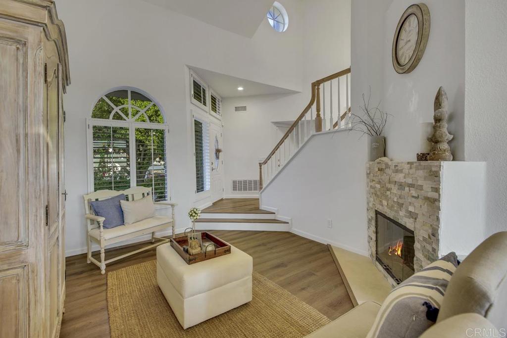 5068 Nighthawk Way Oceanside, CA 92056 - Photo 7 of 39 a living room with furniture and a fireplace
