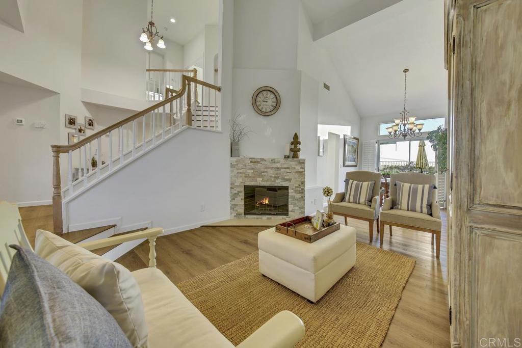 5068 Nighthawk Way Oceanside, CA 92056 - Photo 8 of 39 a living room with furniture and a fireplace