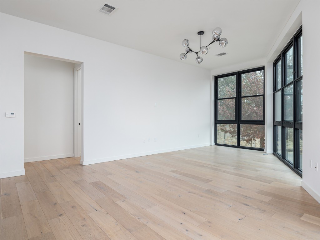 800 Embassy Drive, Unit 237 Austin, TX 78702 - Photo 11 of 35 Large corner unit with windows floor to Ceiling