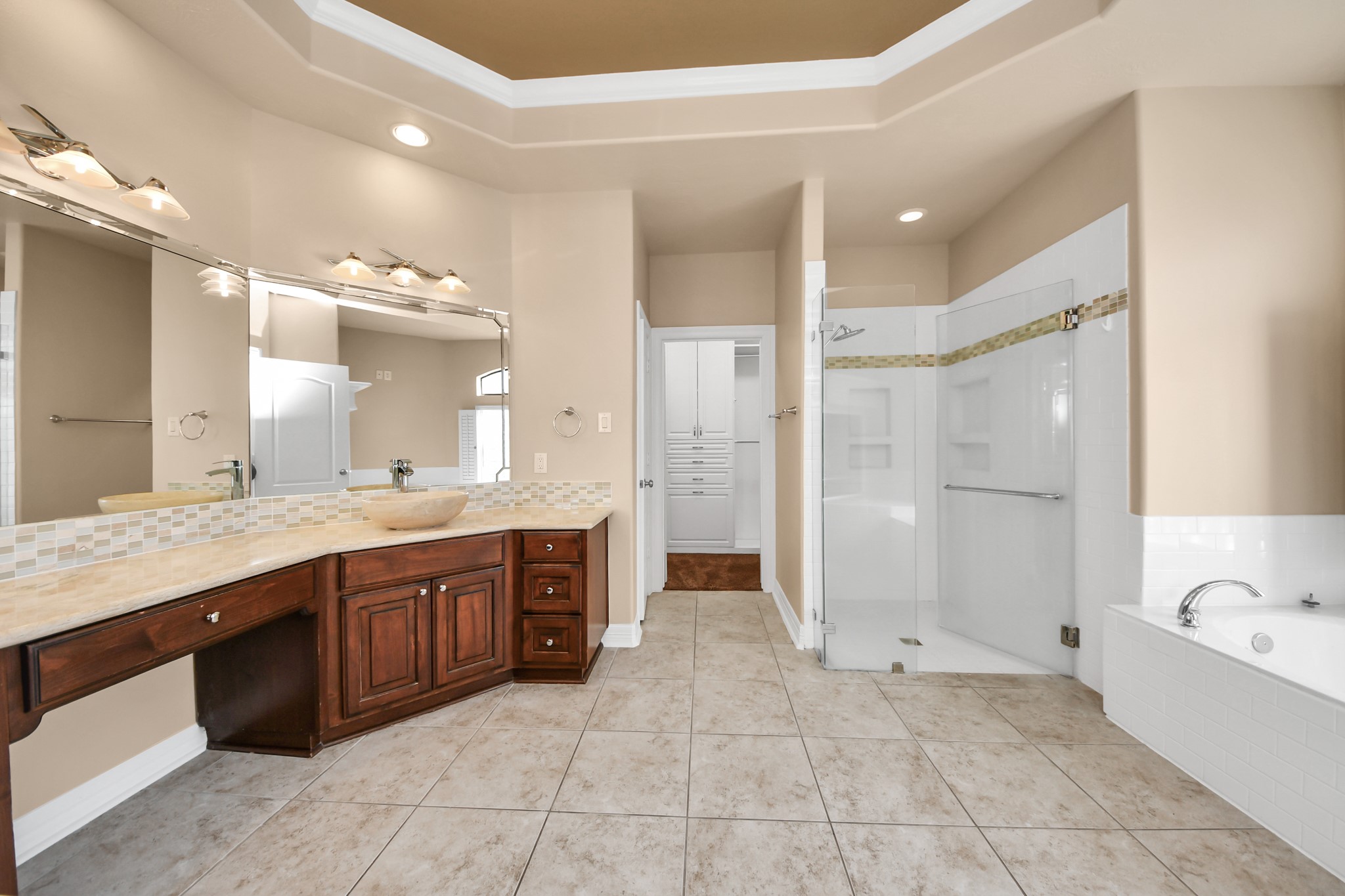 3511 River Bend Drive Rosenberg, TX 77471 - Photo 22 of 50 Large primary bath complete with a walk-in shower and relaxing jetted tub.