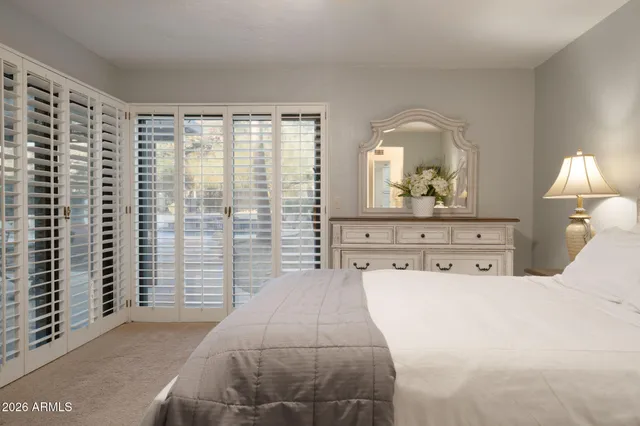 a kitchen with stainless steel appliances granite countertop a sink stove and microwave