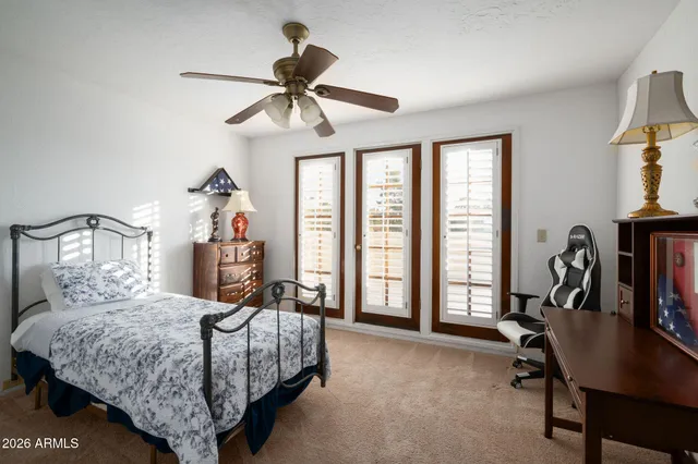 a bathroom with a shower sink and mirror